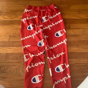 Red Champion Pants with white Champion logo.